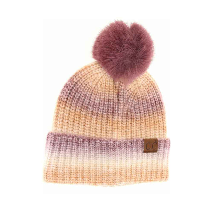 GingerBrownmulti- C.C Multicolor Ombre Beanie with Soft Faux Color Fur Pom, wear it before running out the door into the cool air to keep yourself warm and toasty and look absolutely beautiful. You’ll want to reach for this toasty beanie to keep you incredibly warm everywhere and every occasion. 