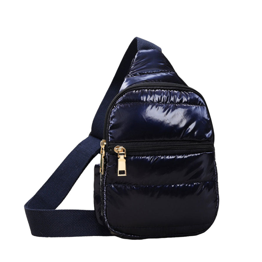Glossy Navy Solid Puffer Mini Sling Bag, be the ultimate fashionista while carrying this Solid Puffer Sling bag in style. It's great for carrying small and handy things. Keep your keys handy & ready for opening doors as soon as you arrive. The adjustable lightweight features room to carry what you need for long walks or trips.