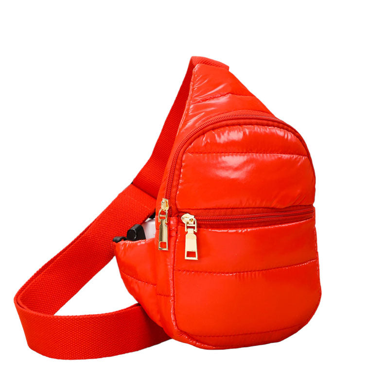 Glossy Red Solid Puffer Mini Sling Bag, be the ultimate fashionista while carrying this Solid Puffer Sling bag in style. It's great for carrying small and handy things. Keep your keys handy & ready for opening doors as soon as you arrive. The adjustable lightweight features room to carry what you need for long walks or trips.