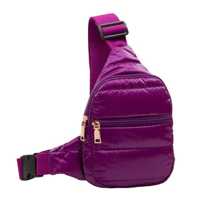 Glossy Purple Solid Puffer Mini Sling Bag, be the ultimate fashionista while carrying this Solid Puffer Sling bag in style. It's great for carrying small and handy things. Keep your keys handy & ready for opening doors as soon as you arrive. The adjustable lightweight features room to carry what you need for long walks or trips.