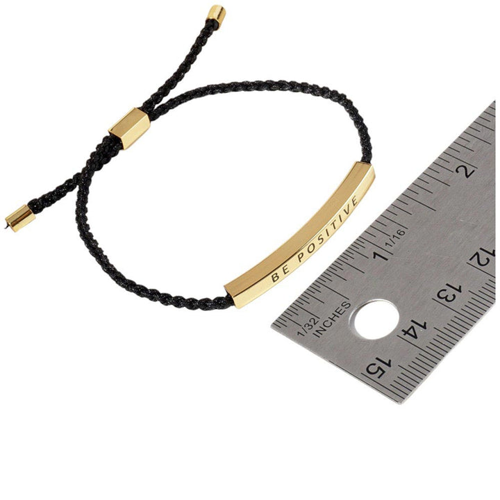 Gold-Dipped BEST FRIENDS Message Bar Pointed Rope Adjustable Cinch Pull Tie Bracelet is the perfect way to show your friendship. With its adjustable cinch pull tie design, this bracelet will fit comfortably on any wrist. The dipped message bar adds a unique touch, making it a must-have accessory. 