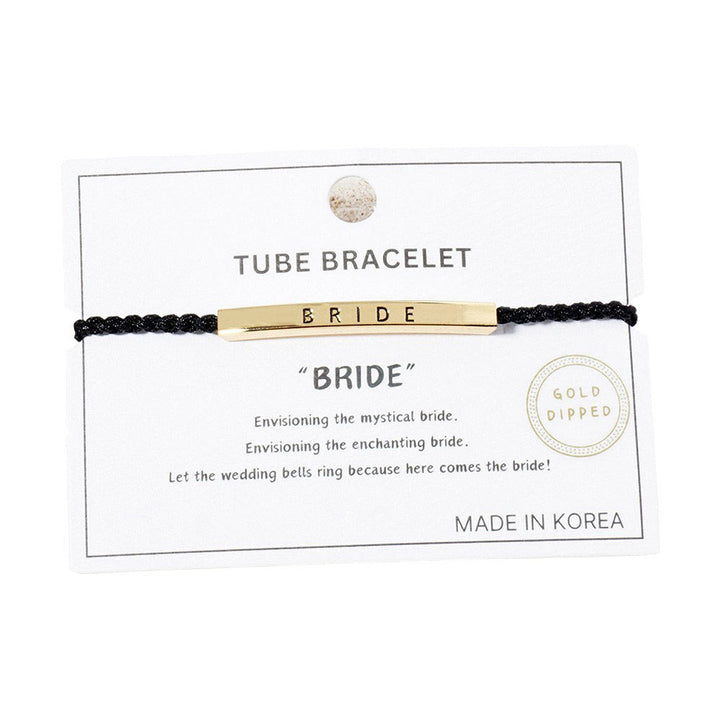 Gold-Dipped BRIDE Message Bar Pointed Rope Adjustable Cinch Pull Tie Bracelet is perfect for the bride-to-be. Its adjustable cinch pull tie design allows for a customizable fit. With a delicate and sleek design, this bracelet will add just the right touch of elegance to any bridal ensemble. 