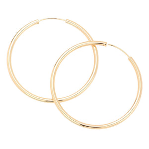 Gold 2 Inch Brass Metal Endless Hoop Earrings, turn your ears into a chic fashion statement with these brass metal hoop earrings! The beautifully crafted design adds a gorgeous glow to any outfit. Put on a pop of color to complete your ensemble in perfect style. These adorable endless hoop earrings are bound to cause a smile. 