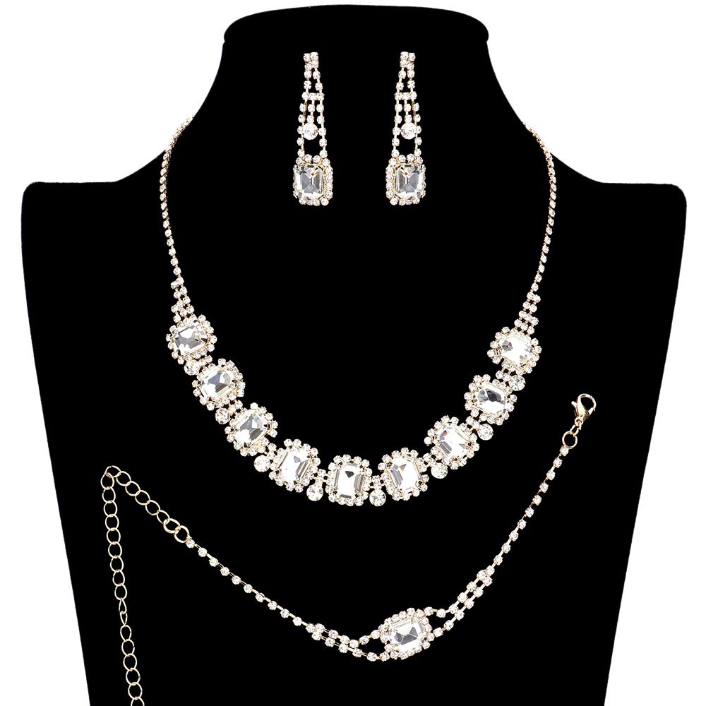 Gold 3PCS Emerald Cut Stone Accented Necklace Jewelry Set, perfect for making a statement. Featuring a classic emerald cut in a shimmering, rhinestone finish. The perfect combination of timeless style and sophistication. Add a touch of glamour and sophistication to any outfit. Perfect for any special occasion and others.