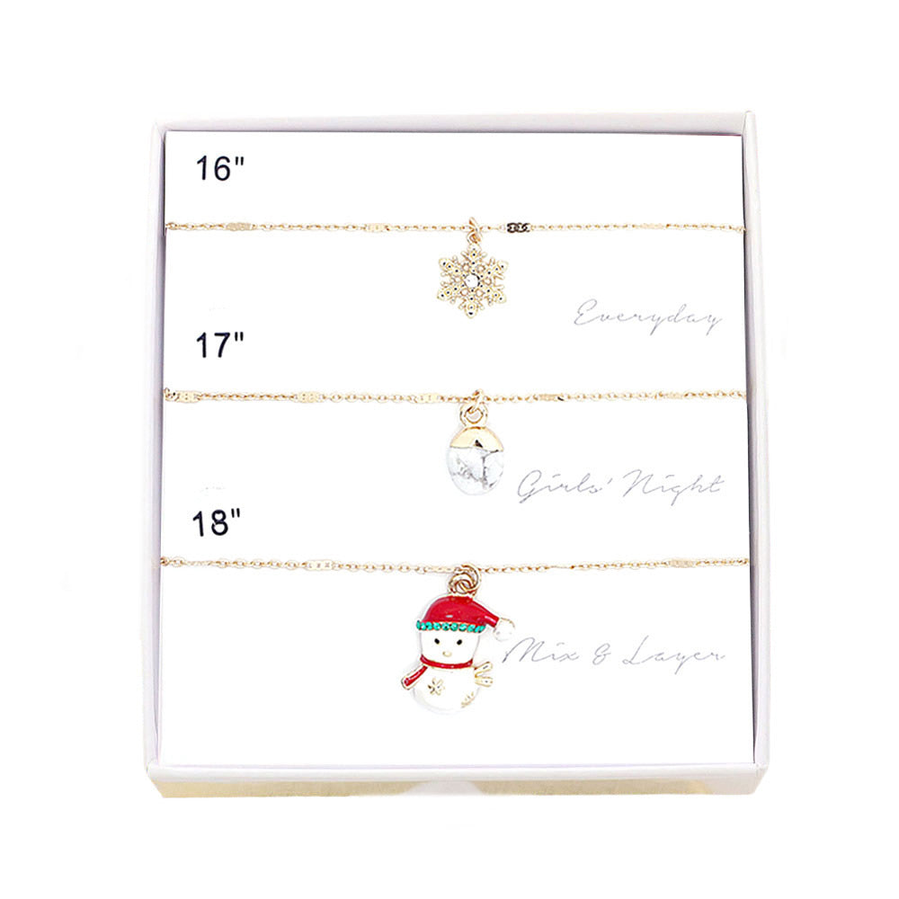 Gold 3PCS Snowflake Natural Stone Snowman Pendant Necklaces, are perfect for the upcoming Christmas holiday. These necklaces will add a touch of fun and color to any outfit. The perfect gift for your loved ones, these necklaces make a lasting impression.