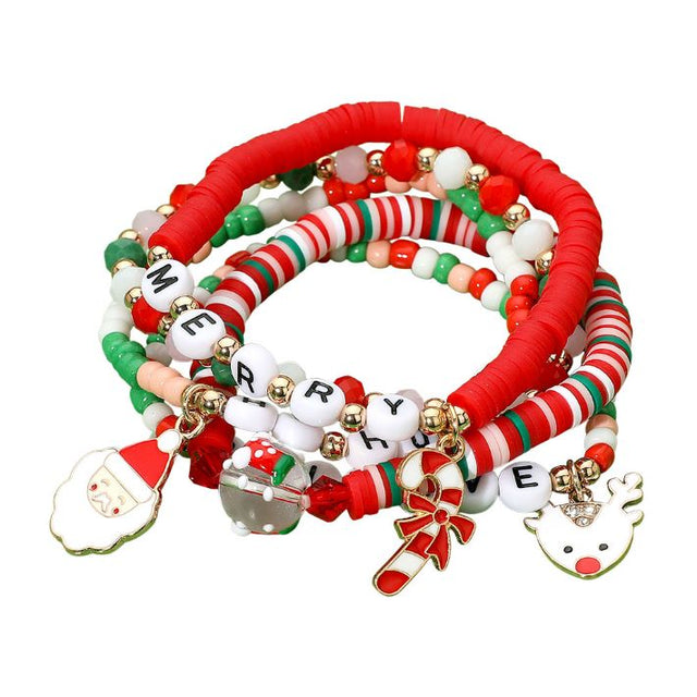 Playful holiday coil bracelet set with colorful beads, festive charms including Santa, reindeer, candy cane, and Merry letters. A fun accessory to celebrate Christmas style and perfect for holiday gifting.