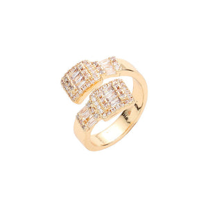 Gold Baguette Stone Accented Band Ring, is a timeless classic. Crafted with high-quality materials, its sleek, stylish design is set with an eye-catching baguette-shaped stone, adding a sparkle to any look. The perfect accessory to dress up any outfit and make a statement on any special occasion. Perfect gift idea.