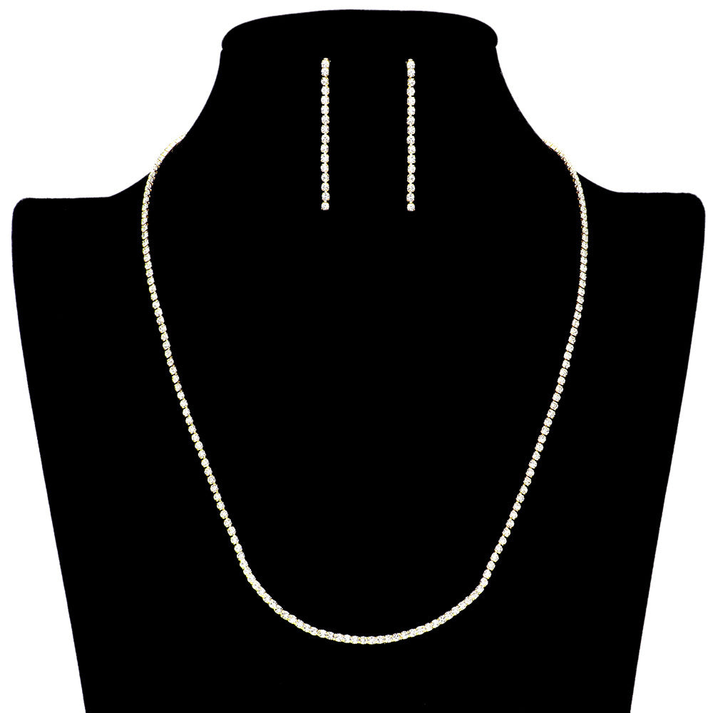 Gold Basic Rhinestone Necklace, exudes timeless elegance, crafted from gleaming rhinestones. Its classic design will forever remain in style, making it an ideal accessory for a variety of occasions. This unique set is a great way to add a touch of glamour and sophistication to any outfit. Perfect for any special occasion.