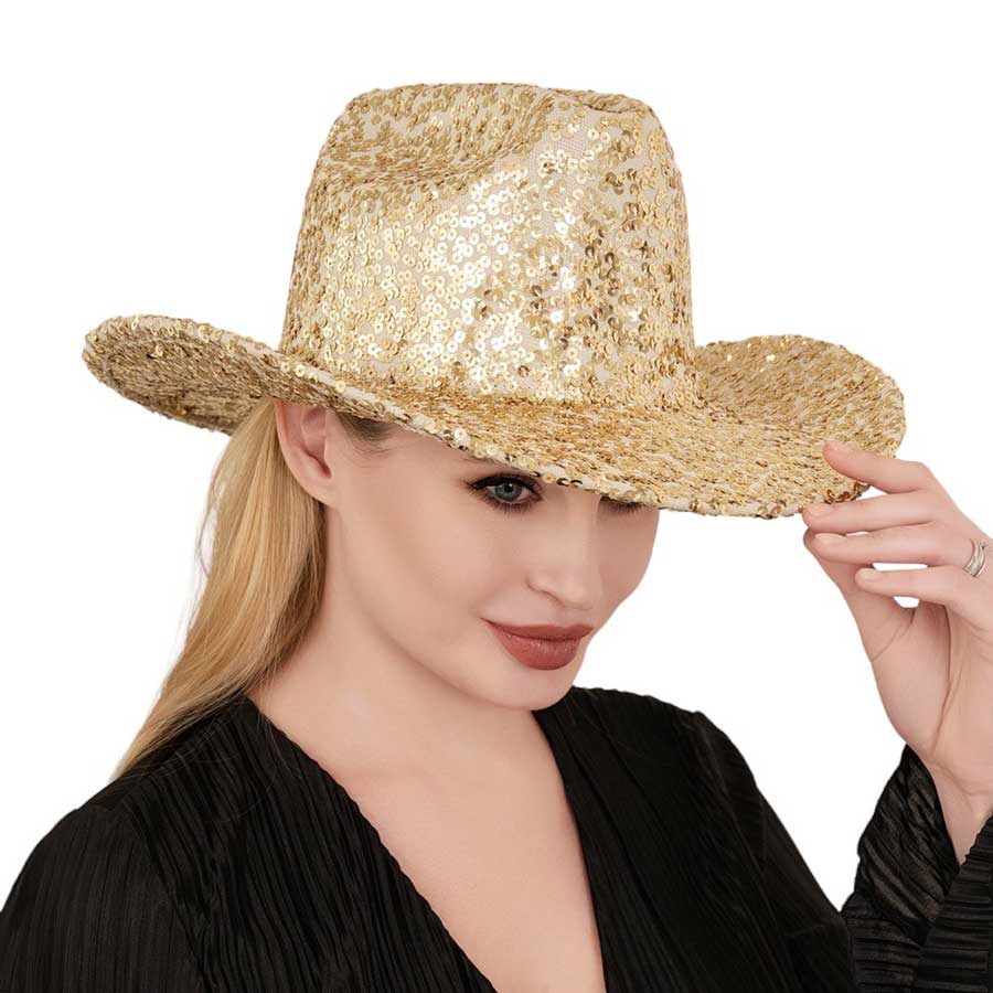 Gold Bling Sequin Cowboy Western Hat. Elevate your style with our luxurious premium hat that is adorned with dazzling sequins, making it a statement piece for any outfit. Perfect for adding a touch of glamour to your Western look. Embrace your inner cowgirl and shine bright with this exquisite accessory.
