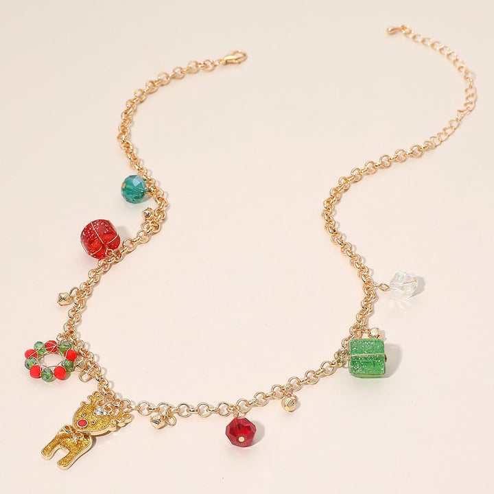 Bring festive joy to your style with this Christmas reindeer charm necklace featuring holiday-themed pendants like a wreath, gift, and sparkling beads. Designed on a delicate chain, this playful accessory is perfect for parties, gifting, or adding cheerful charm to your holiday outfits.