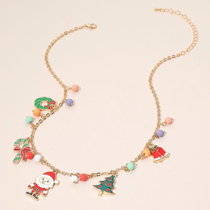 Spread holiday cheer with this Christmas charm necklace featuring festive pendants like Santa, a tree, candy cane, and bell. Accented with colorful beads on a delicate chain, this playful accessory is perfect for holiday parties, gift giving, or adding seasonal sparkle to your look.