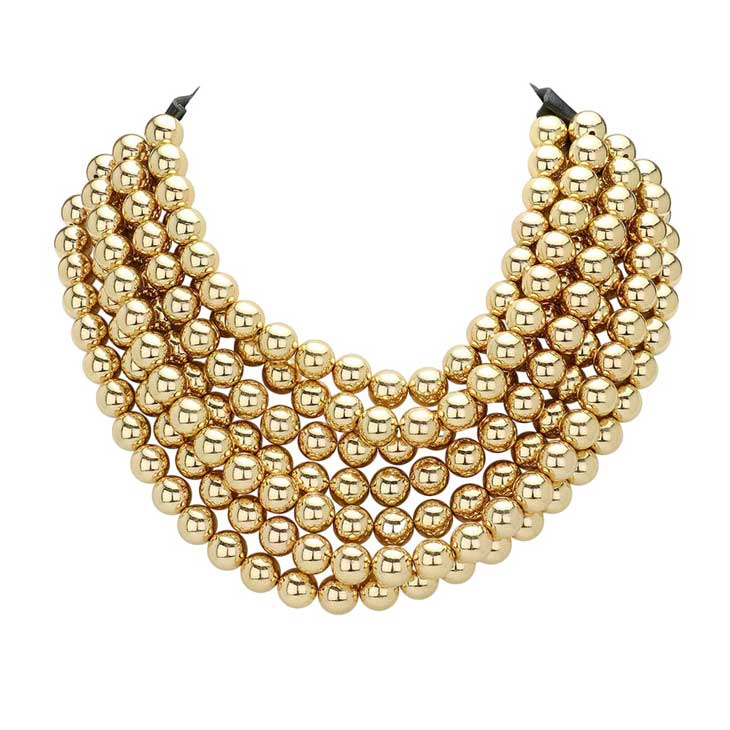 Gold Chunky Metal Ball Beaded Multi Layered Faux Leather Magnetic Necklace, Add a bold touch to your wardrobe with this necklace. Featuring multiple strands of soft faux leather adorned with chunky metal ball beads, this statement necklace effortlessly elevates any outfit. The magnetic clasp ensures easy wear.