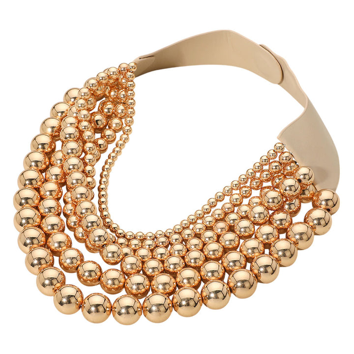 Gold Chunky Metal Ball Beaded Multi-Layered Faux Leather Magnetic Necklace combines bold design with functional elegance. Crafted with layered faux leather strands accented by substantial metal ball beads, it delivers a textured, contemporary look. The magnetic clasp provides secure, easy fastening, enhancing wearability without compromising style. Ideal for professionals seeking a statement accessory that balances durability and modern sophistication. 