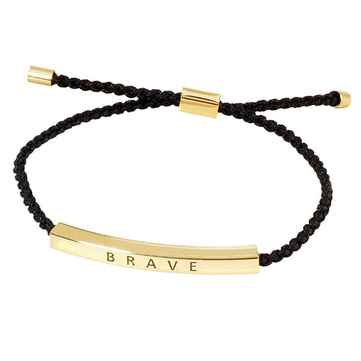 Gold-Dipped BRAVE Message Bar Pointed Rope Adjustable Cinch Pull Tie Bracelet is a unique and versatile accessory that adds a touch of inspiration to any outfit. The adjustable cinch design allows for a comfortable and customizable fit. Made with high-quality materials, it is durable and stylish.