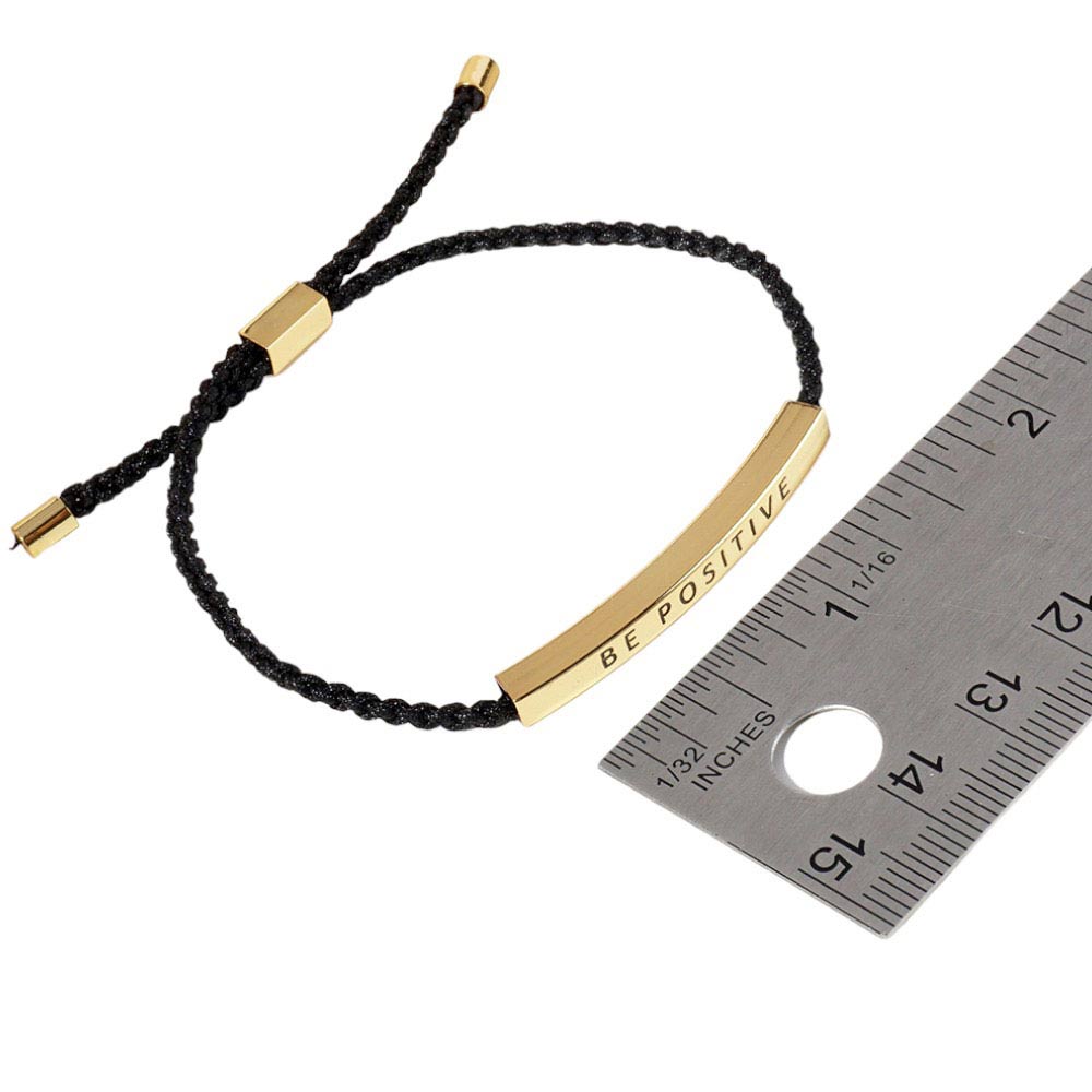 Gold-Dipped BRAVE Message Bar Pointed Rope Adjustable Cinch Pull Tie Bracelet is a unique and versatile accessory that adds a touch of inspiration to any outfit. The adjustable cinch design allows for a comfortable and customizable fit. Made with high-quality materials, it is durable and stylish.