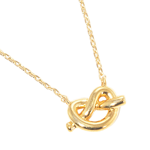 Gold Dipped Knotted Heart Pendant Necklace features a delicate and intricate design perfect for any occasion. The heart pendant is coated in lustrous gold, adding a touch of elegance to the piece. Make a statement with this beautiful necklace that is both stylish and timeless.