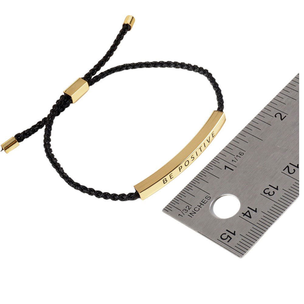 Gold-Dipped SOUL SISTER Message Bar Pointed Rope Adjustable Cinch Pull Tie Bracelet is a stylish and meaningful addition to any outfit. With its adjustable cinch pull tie, it can easily fit any wrist size. The dipped bar features the message "SOUL SISTER", making it the perfect gift for a special friend. 