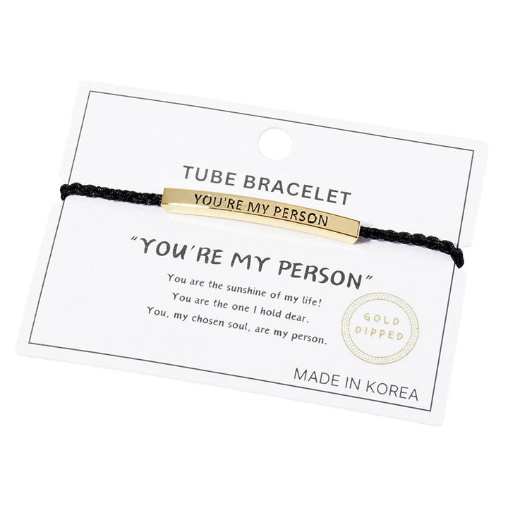 Gold-Dipped YOURE MY PERSON Message Bar Pointed Rope Adjustable Cinch Pull Tie Bracelet is the perfect way to show your special someone how much they mean to you. With a customizable cinch pull tie, it's easy to adjust for a comfortable fit and the message bar adds a personalized touch. 