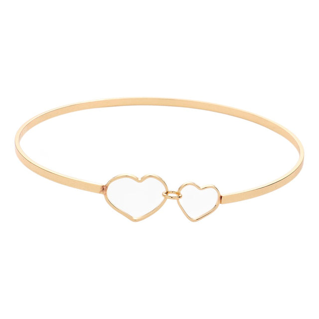 Gold Double Open Metal Heart Link Bangle Bracelet features a unique design that will add a touch of sophistication to any outfit. Made with high-quality metal, it is durable and comfortable to wear. The double open heart link adds a romantic touch, making it the perfect accessory for a date night or special occasion.