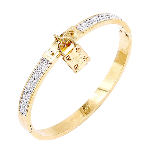 Gold FOREVER LOVE Metal Lock Charm Stainless Steel Bracelet is made of durable stainless steel and features a secure lock charm. The perfect accessory for any outfit, this bracelet is a timeless symbol of love and commitment. With its sturdy construction, it's built to last forever. 