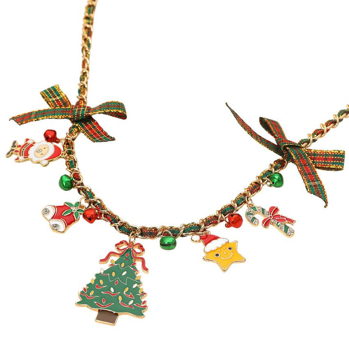 Celebrate the season with this charming holiday necklace featuring playful Christmas-themed pendants and ribbon accents. Perfect for adding a joyful, festive touch to your look, this delightful accessory captures the spirit of the holidays with sparkle and cheer.