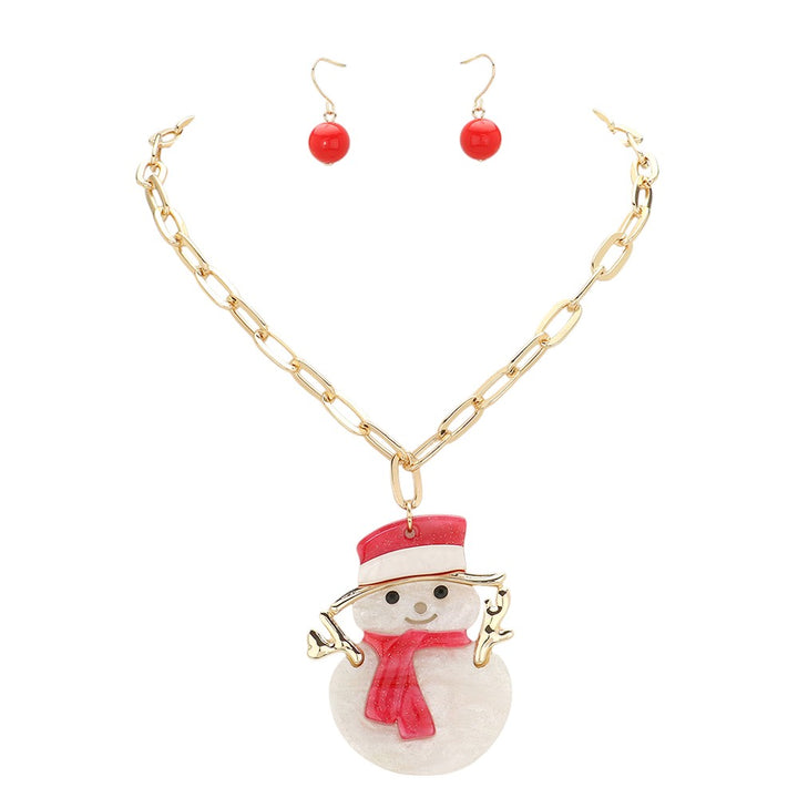 Gold-Glittered Resin Snowman Pendant Jewelry Set is the perfect accessory for the holiday season. Made with sparkling resin, this pendant necklace features a whimsical snowman that will add a touch of festive charm to any outfit. Complete your Christmas look with this charming necklace. A perfect gift for your loved one.