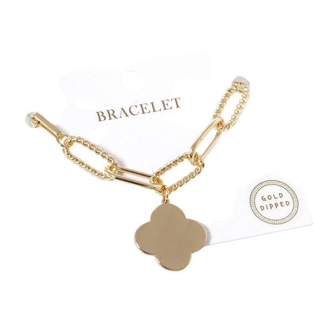 Gold Gold Dipped Quatrefoil Charm Bracelet, features a beautiful gold plating. The quatrefoil charm compliments the bracelet perfectly adding a distinct touch of style. This bracelet is the perfect accessory for any formal or special occasion. Perfect gift for birthdays, Valentine's Day, anniversaries, or any special day. 