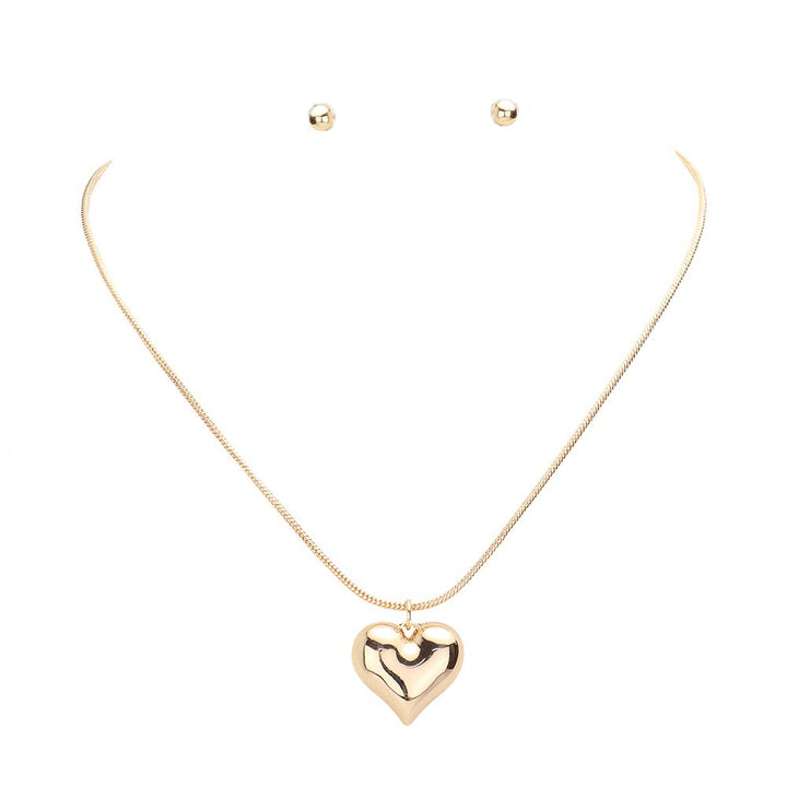 Gold Heart Pendant Jewelry Set, This elegant set combines timeless design with expert craftsmanship. Made with quality materials, each piece reflects the significance of love and devotion. Perfect for any occasion, this set is an ideal gift for a loved one, or simply a beautiful addition to your own collection.