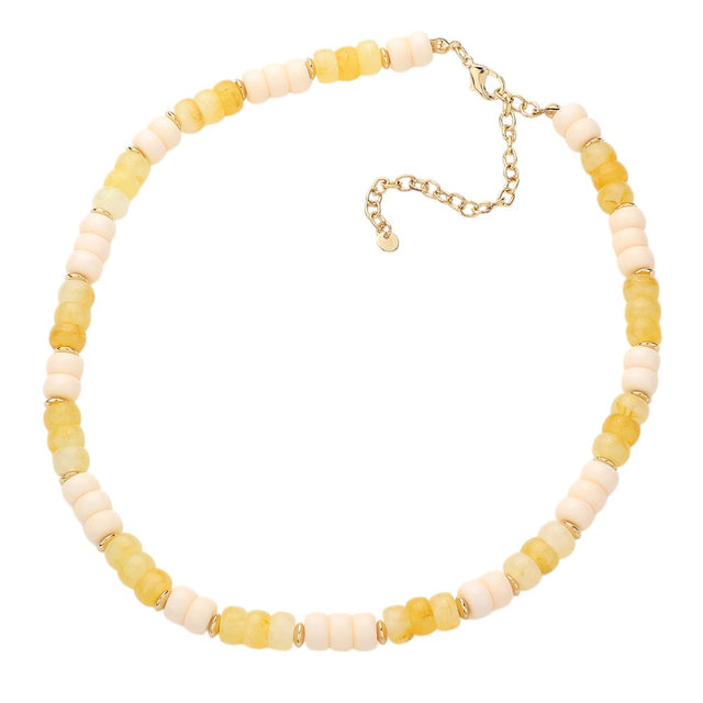 Gold Ivory Chunky Beaded Necklace is a versatile and stylish accessory for any outfit. Made with chunky beads, it adds a touch of elegance and texture to your look. Its bold design makes a statement while being comfortable to wear. Elevate your fashion sense with this eye-catching necklace.