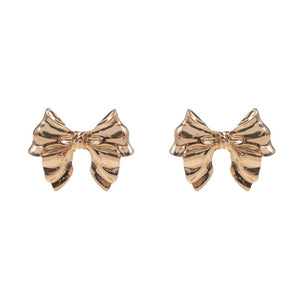 Gold Metal Bow Earrings will add a touch of elegance and sophistication to any outfit. Made from high-quality metal, they are durable and comfortable to wear. The unique bow shape adds a delicate touch to these earrings. Perfect for both casual and formal occasions. A lovely gift choice for any fashion forwarded individual.