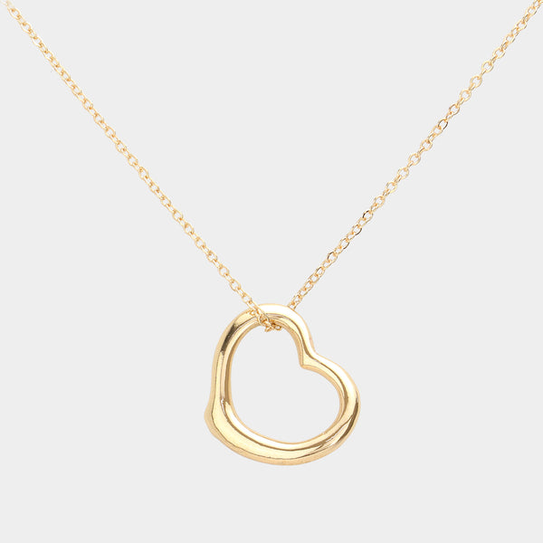 Gold Metal Heart Cut-Out Pendant Necklace showcases a modern cut-out design, adding a touch of elegance to any outfit. Made with high-quality materials, this necklace is both durable and stylish. Elevate your look with this versatile accessory that perfectly blends beauty and functionality. 