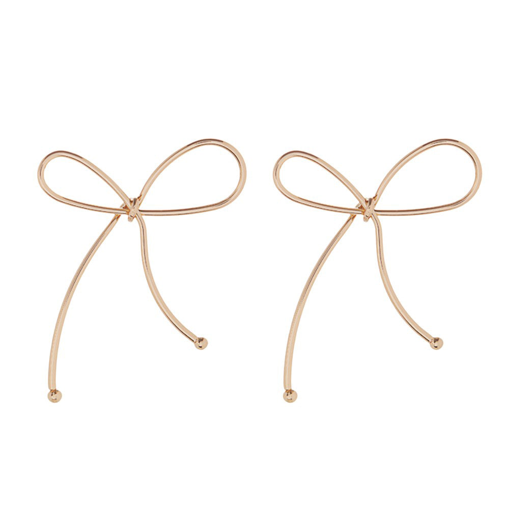 Gold Metal Wire Bow Earrings, Expertly crafted from high-quality metal wire, these bow earrings are the perfect addition to any outfit. The delicate design adds a touch of elegance, and sophistication to any outfit, these earrings are lightweight and comfortable to wear. Perfect for special occasions or everyday wear.
