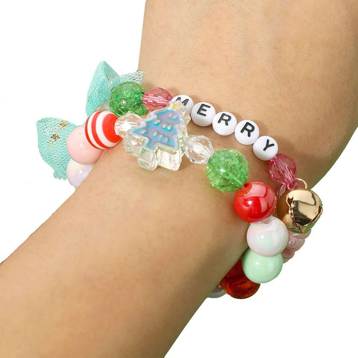 Celebrate the season with this charming holiday bracelet set featuring colorful beads, playful charms, and festive accents. Designed with easy stretch bands, these cheerful accessories add a joyful touch to any outfit, perfect for parties, gifting, or holiday fun.