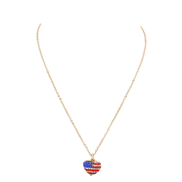 Gold Multi Crystal Pave American Flag Heart Pendant Necklace, enhance your attire with these vibrant artisanal earrings to show off your fun trendsetting style. Show your love for your country with these sweet American Flag heart necklaces.