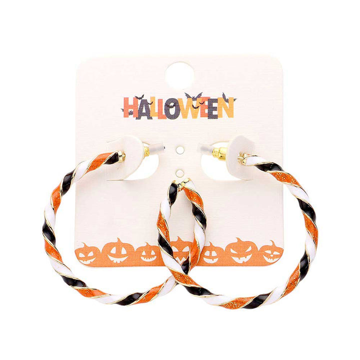 Gold-Orange-Enamel Halloween Twisted Hoop Earrings add a festive touch to any outfit. Made from durable materials, they are perfect for wear during the holiday season. Featuring a unique twisted design and vibrant enamel colors, these earrings are a must-have for any Halloween enthusiast.