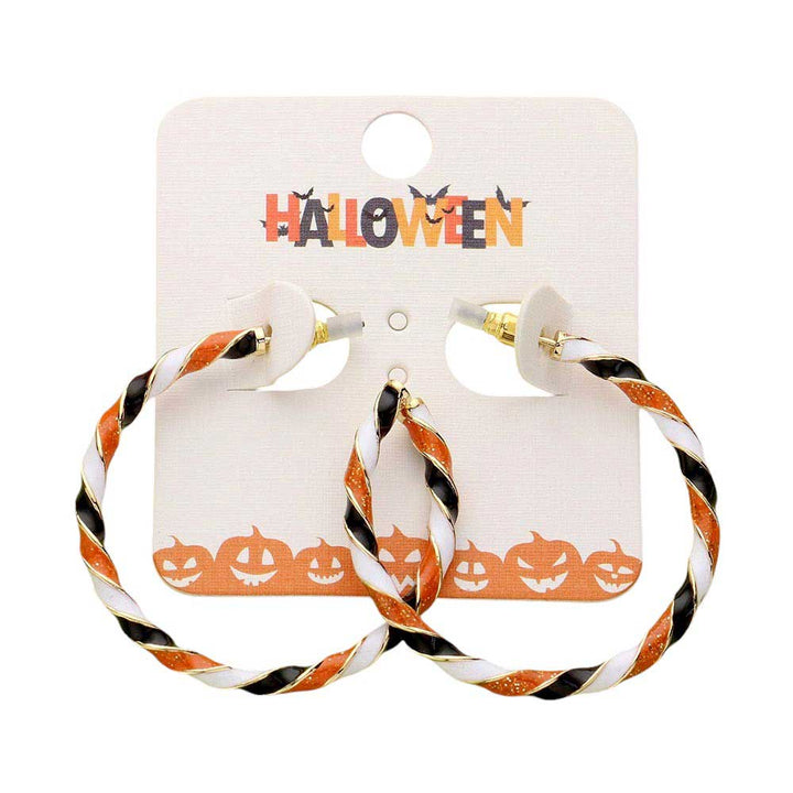 Gold-Orange-Enamel Halloween Twisted Hoop Earrings add a festive touch to any outfit. Made from durable materials, they are perfect for wear during the holiday season. Featuring a unique twisted design and vibrant enamel colors, these earrings are a must-have for any Halloween enthusiast.