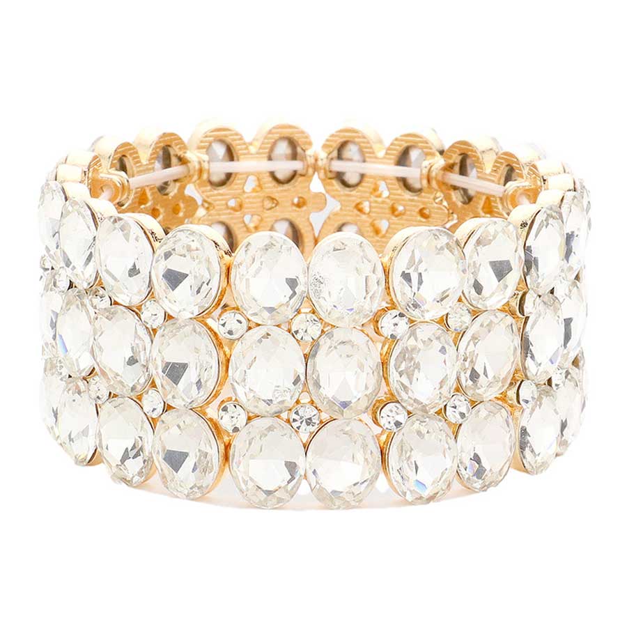 Gold Oval Stone Cluster Stretch Evening Bracelet, This beautiful bracelet features an elegant design with 14K rose gold plated accents and center stones for a stunning, eye-catching look. Enjoy the comfort of the elasticized fit and the glamour of special occasions. Perfect for your next formal event or evening out.
