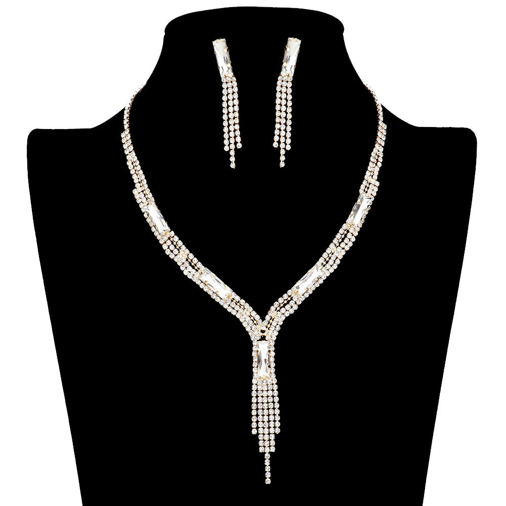 Gold Rectangle Stone Accented Rhinestone Fringe Tip Jewelry Set, perfect for adding a touch of elegance to any special occasion outfit. Featuring a beautiful rectangle stone accent, this necklace and earring set will be a unique addition to any jewelry collection. Perfect gift choice for loved ones on any special day.