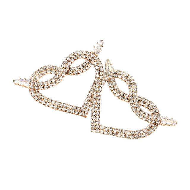 Gold Rhinestone Pave Heart Earrings add a touch of glamour to any outfit. Made with sparkling rhinestones, they are perfect for special occasions or everyday wear. The pave setting provides a secure hold while adding a subtle shine. Elevate your style with these timeless earrings.