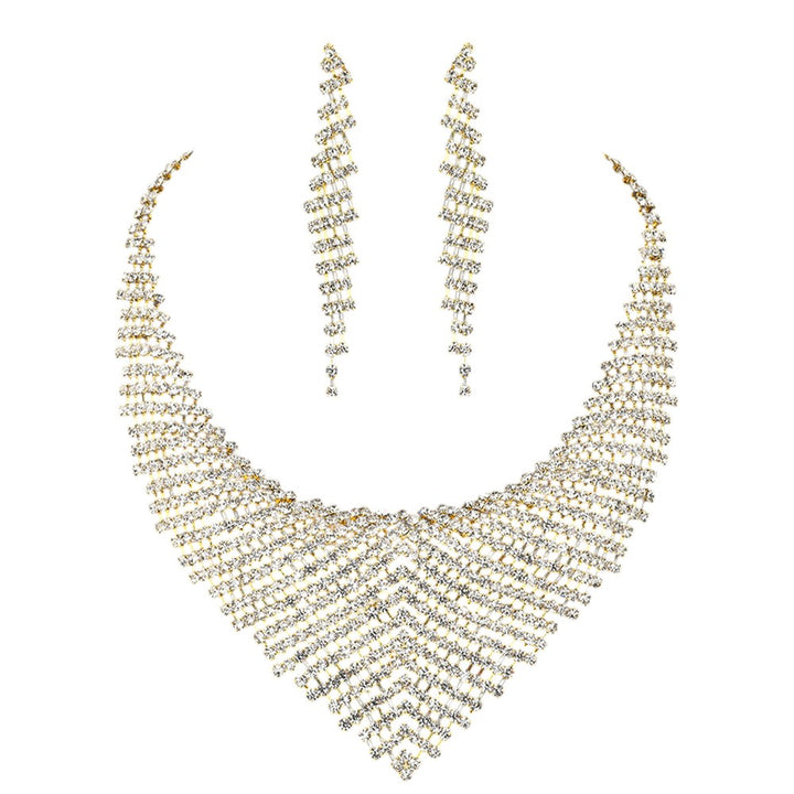 Gold Rhinestone Paved Collar Necklace adds an instant touch of glamour to any outfit. With precision-placed rhinestones, this necklace shines and sparkles with every movement. The perfect accessory for any formal event or special occasion.
