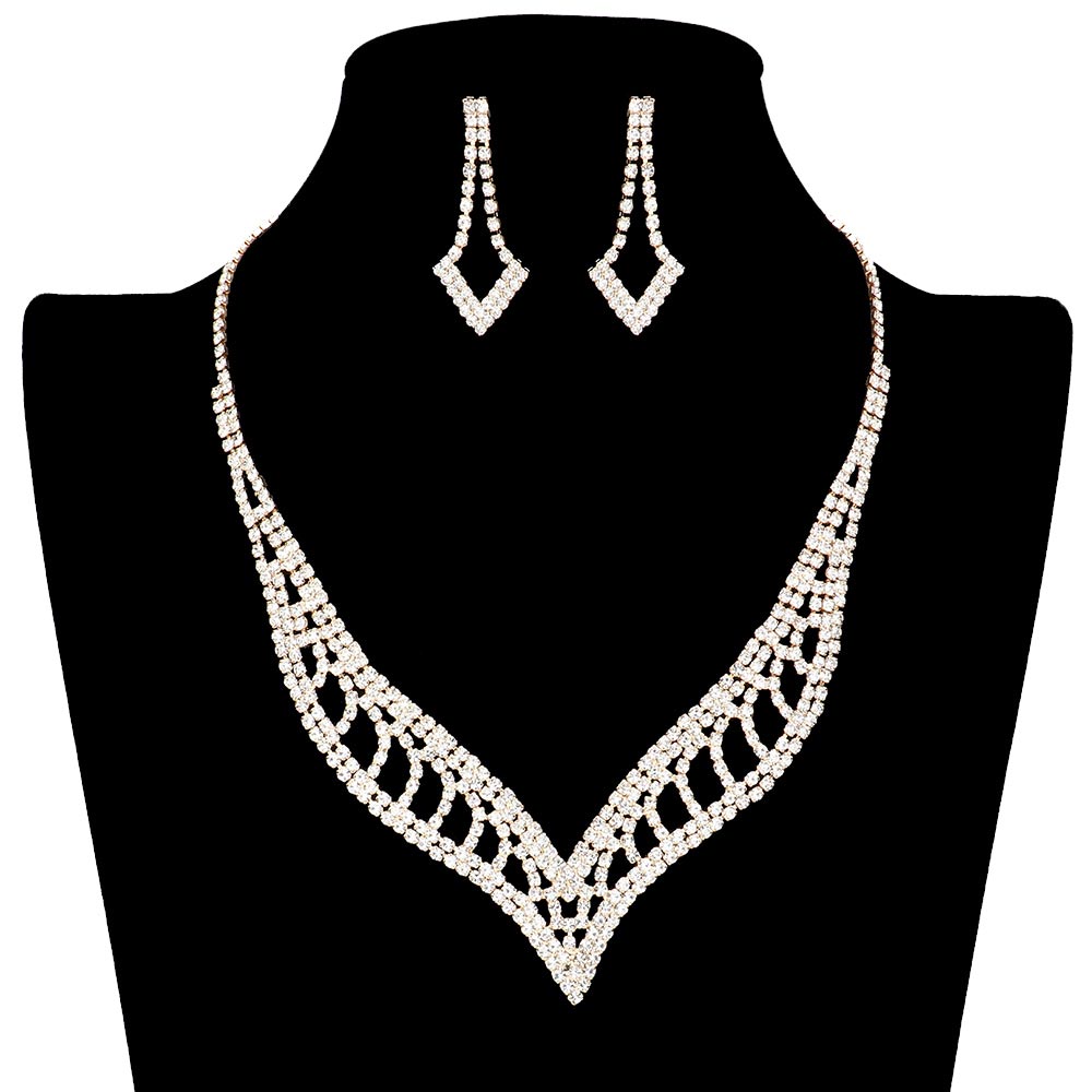 Gold Rhinestone Paved V Shaped Jewelry Set, is a perfect accessory to stand out from the crowd. Its unique V-shaped design is paved with high-quality rhinestones, providing a unique and eye-catching sparkle. Crafted from quality metals and rhinestones. Perfect for any special occasion or making a timeless lovely gift.