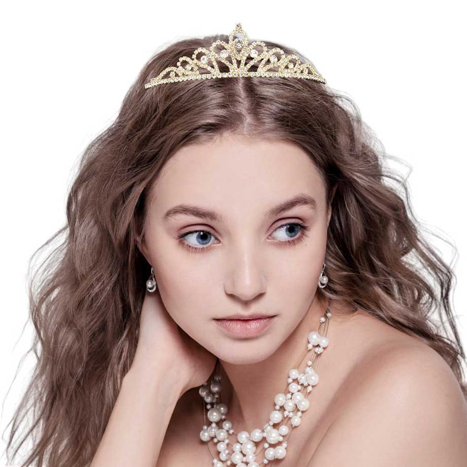 AB Gold Round Stone Pointed Princess Tiara, adds a touch of royalty to any special event. Featuring a round stone pointed design with a comfortable fit, this tiara is perfect for any princess getup on any occasion. A perfect gift for birthdays, weddings, bridal showers, Valentine's Day, and other special occasions.