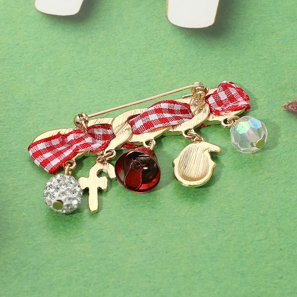 Celebrate the season with this cheerful holiday charm bracelet featuring festive icons like Santa, candy canes, and bells. The classic ribbon weave adds a cozy touch, making it the perfect accessory for spreading joy and sparkle at every holiday gathering.