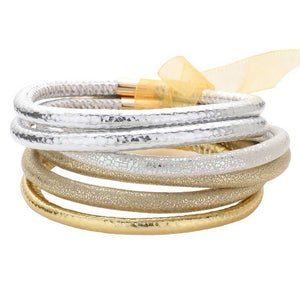 Gold Silver 6pcs Faux Leather Tube Bangle Bracelets, offers a stylish, yet affordable way to add a touch of fashion and elegance to any look. Crafted with quality materials, these bracelets are durable and designed to last. Perfect for accessorizing any outfit, these faux leather bangle bracelets will add a unique touch of class.