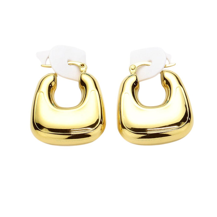 Gold Stainless Steel Chunky Hoop Pin Catch Earrings are made with high-quality stainless steel, ensuring durability and long-lasting shine. The secure pin catch design ensures they will stay in place while adding a statement to any outfit. The perfect mix of style and functionality.