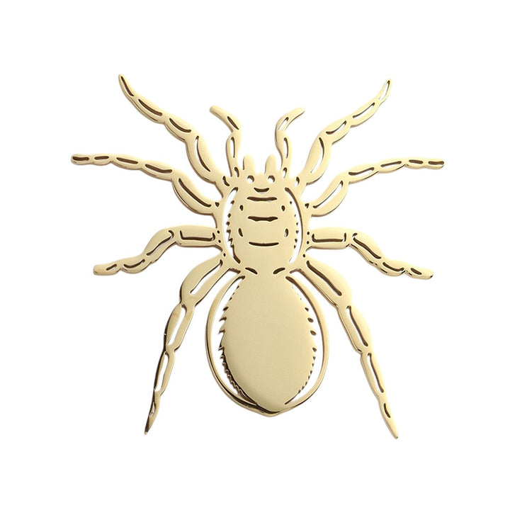 Gold Stainless steel cutout spider pin brooch is a sleek and stylish accessory that adds a touch of edginess to any outfit. Made from high-quality stainless steel, it is durable and long lasting, making it a great addition to your jewelry collection. With its unique design and expert craftsmanship, this pin brooch is sure to make a statement.