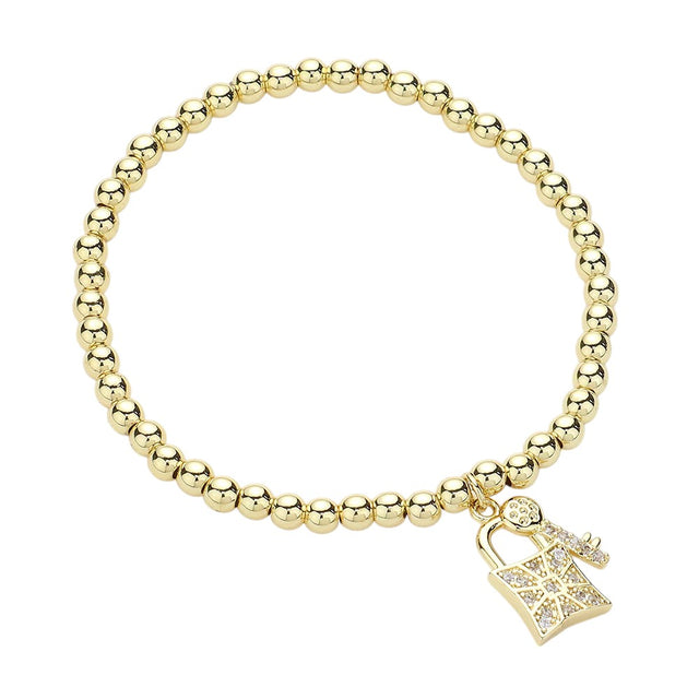 Gold Stainless Steel Stone Paved Key and Lock Charm Stretch Ball Bracelet is a beautiful and unique accessory that adds a touch of elegance to any outfit. Made with high-quality stainless steel and featuring a charming key and lock design, this bracelet is also stretchable for a comfortable fit. Perfect for any occasion, this bracelet is a must-have for any jewelry collection.