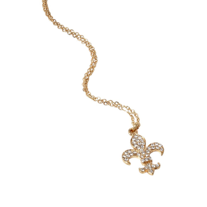 Gold-Stone Paved Fleur de Lis Pendant Necklace are expertly crafted with a unique design and paved with high-quality stones for a stunning effect. This necklace is perfect for adding a touch of elegance and sophistication to any outfit. Enhance your style with this beautiful pendant necklace today. 