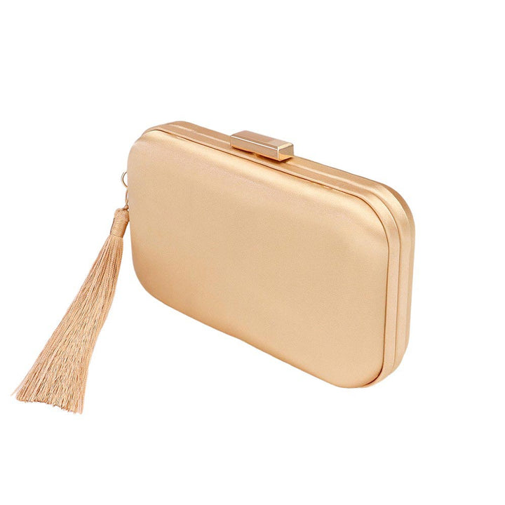 Gold Tassel Pointed Solid Clutch Crossbody Bag, Give your style a playful twist with this! Featuring a unique pointed shape and eye-catching tassel accents, this bag is perfect for adding a touch of quirkiness to any outfit. Stay organized and stylish with this fun and functional accessory.