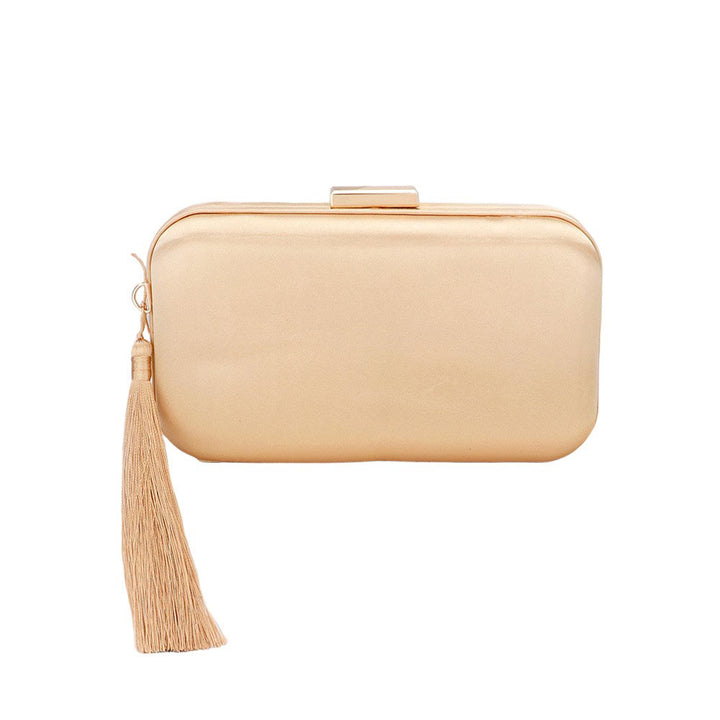 Gold Tassel Pointed Solid Clutch Crossbody Bag, Give your style a playful twist with this! Featuring a unique pointed shape and eye-catching tassel accents, this bag is perfect for adding a touch of quirkiness to any outfit. Stay organized and stylish with this fun and functional accessory.